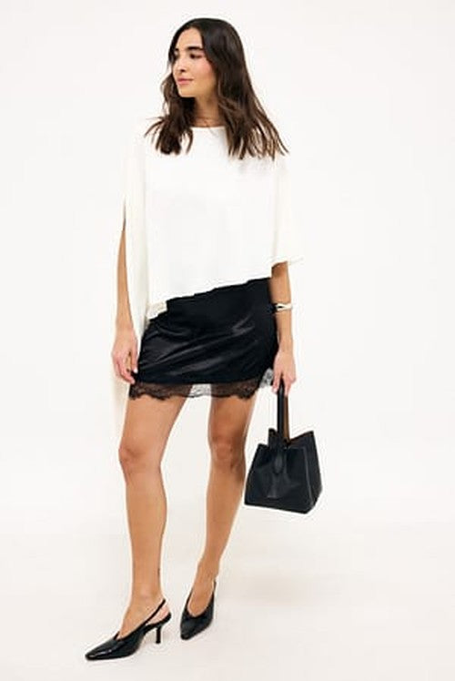 Asymmetrische Kantenrok - Elegante Saiaallure