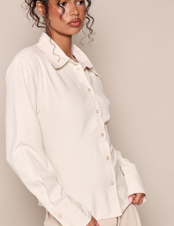Perzikzachte Fitted Blouse met Schoudervullingen